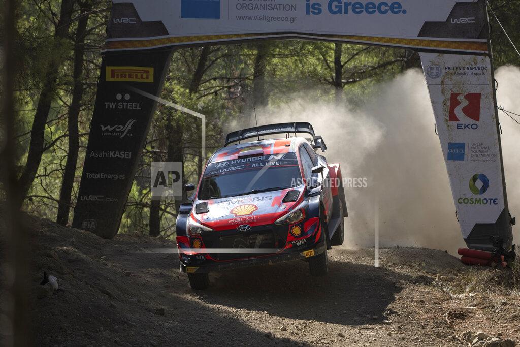 Petros Giannakouris Jourdan Serderidis of Greece and his co driver Fred Miclotte of Belgium compete in the WRC Acropolis Rally at the stage of Aghii Theodori, west of Athens, on Friday, Sept. 10, 2021. The World Rally Championship returned to Greece after an eight-year absence. (AP Photo/Petros Giannakouris)