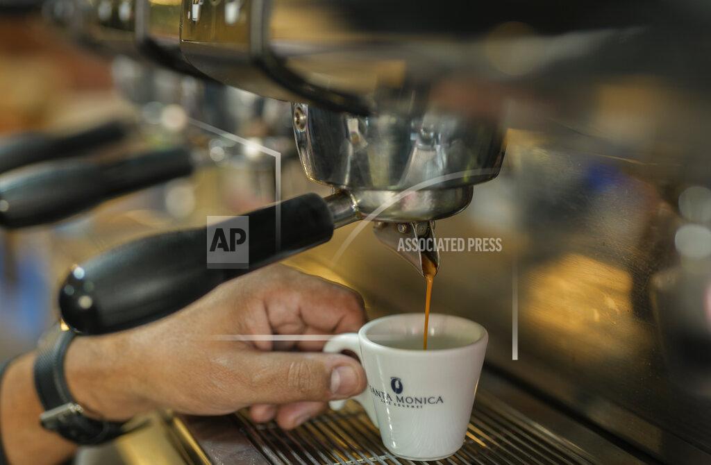 Andre Penner An espresso cup is prepared at a restaurant in Sao Paulo, Brazil, Thursday, May 12, 2022. Coffee is among the products that rose in price recently, eroding the buying power of consumers and angering potential voters, who fault President Jair Bolsonaro. (AP Photo/Andre Penner)