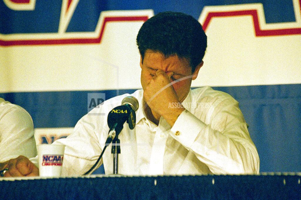Charles Rex Arbogast FILE - In this March 28, 1992, file photo, Kentucky head coach Rick Pitino reacts at a press conference after Duke beat Kentucky in overtime 104-103 in an East Regional Final NCAA college basketball game in Philadelphia. (AP Photo/Charles Rex Arbogast, File)