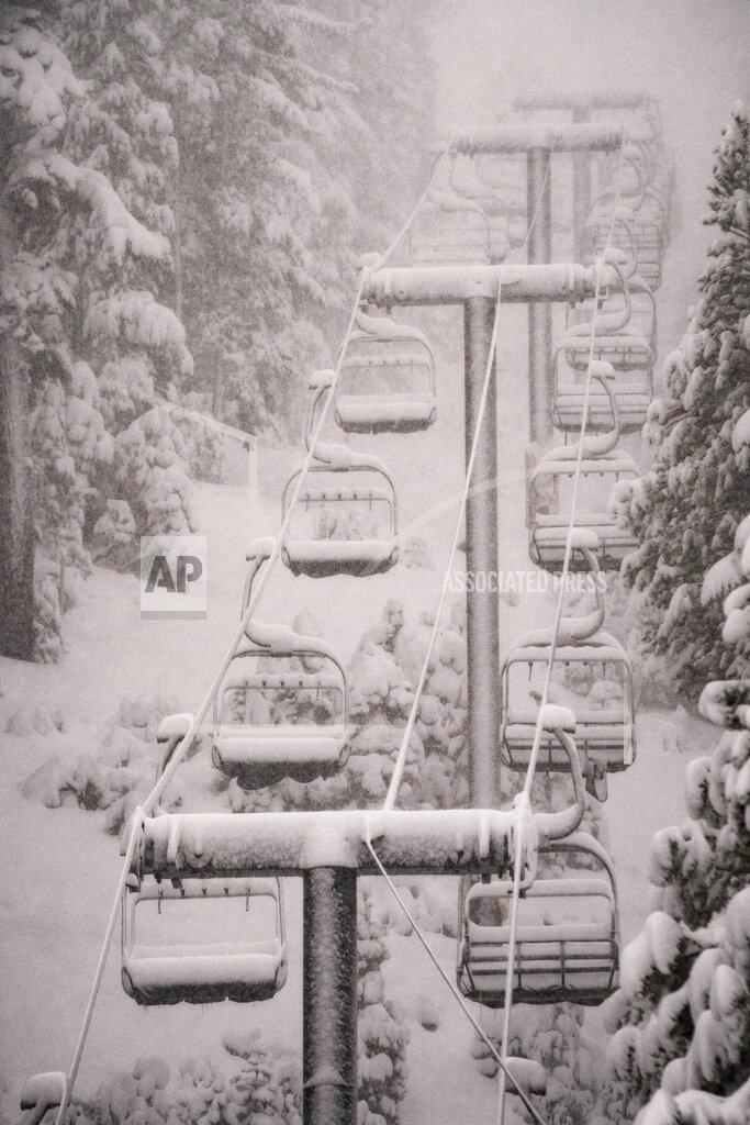 Christian Pondella In this photo provided by Mammoth Mountain Ski Area, snow falls on Mammoth Mountain, Monday, Oct. 25, 2021, in Mammoth Lakes, Calif. (Christian Pondella/Mammoth Mountain Ski Area via AP)