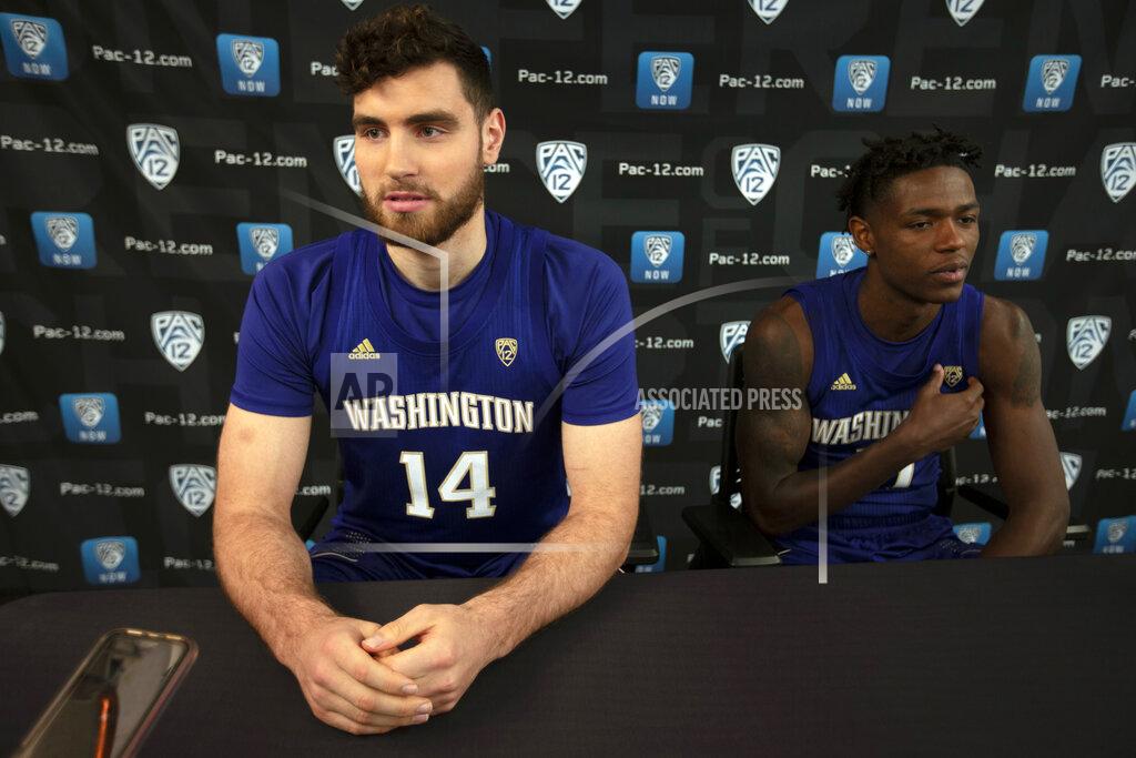 D. Ross Cameron Washington's Sam Timmins, left, and Nahziah Carter speak during the Pac-12 NCAA college basketball media day, in San Francisco, Tuesday, Oct. 8, 2019. (AP Photo/D. Ross Cameron)