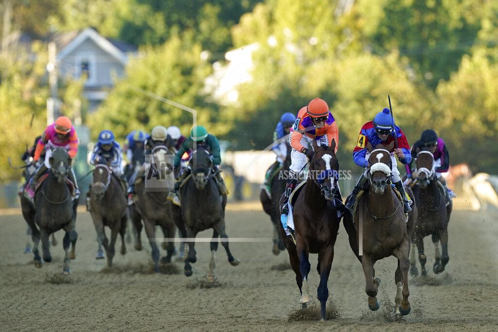 Steve Helber Swiss Skydiver (4), ridden by Robby Albarado, leads Authentic (9), ridden by John Velazquez, to win the 145th Preakness Stakes horse race at Pimlico Race Course, Saturday, Oct. 3, 2020, in Baltimore. (AP Photo/Steve Helber)