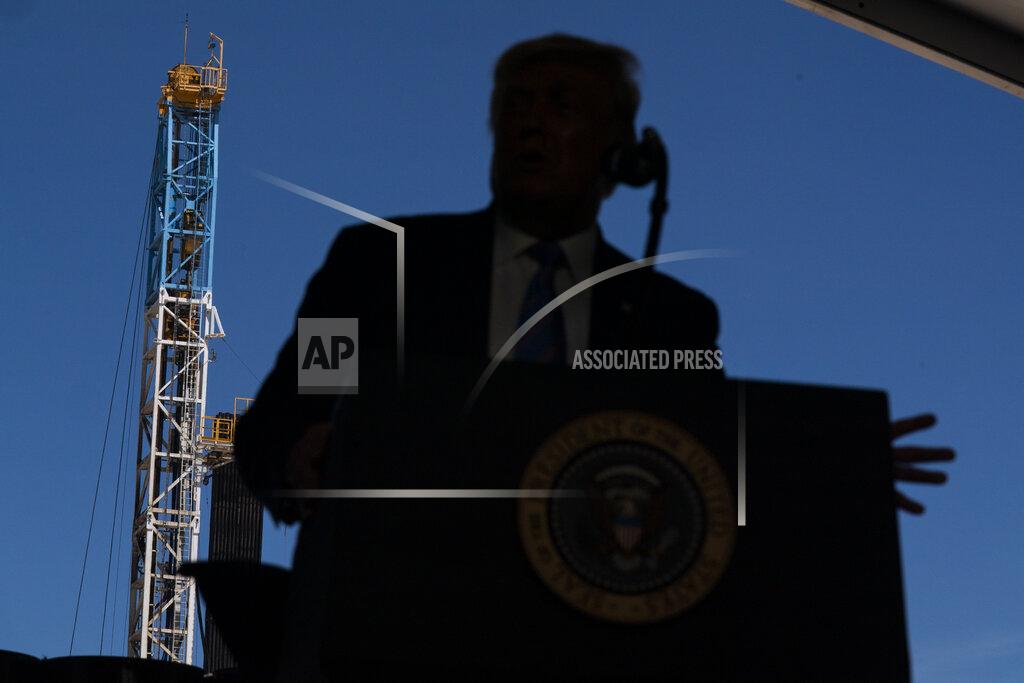 Evan Vucci President Donald Trump delivers remarks about American energy production during a visit to the Double Eagle Energy Oil Rig, Wednesday, July 29, 2020, in Midland, Texas. (AP Photo/Evan Vucci)