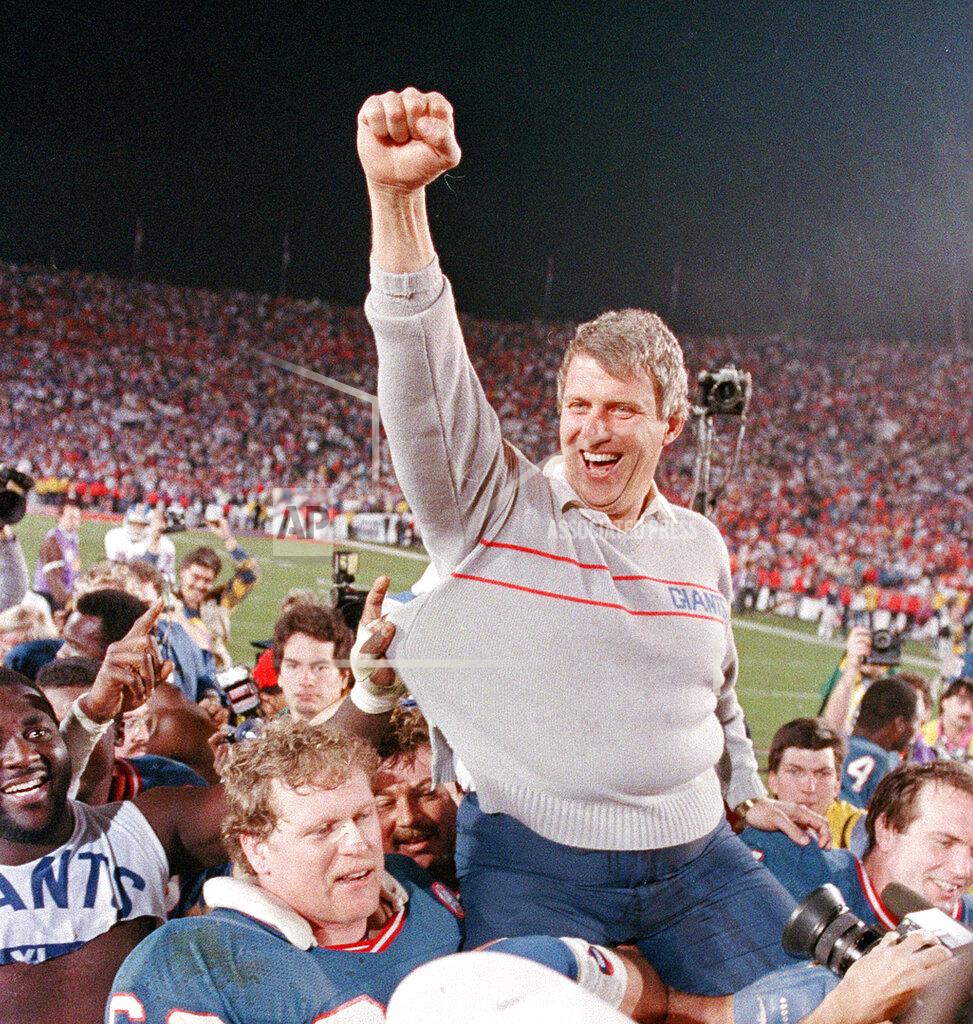 Eric Risberg FILE - In this Jan. 25, 1987, file photo, New York Giants coach Bill Parcells is carried off the field after the Giants defeated the Denver Broncos, 39-20, in Super Bowl XXI in Pasadena, Calif. (AP Photo/Eric Risberg, File)