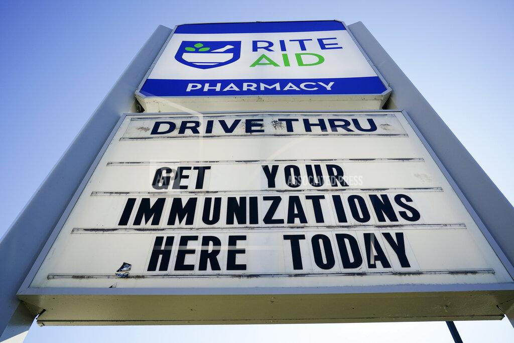 Matt Rourke Shown is a sign outside a Rite-Aid pharmacy in Steelton, Pa., that is administering COVID-19 vaccinations, Friday, March 5, 2021. (AP Photo/Matt Rourke)