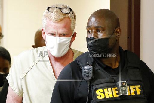 Alex Murdaugh walks into his bond hearing Thursday, Sept. 16, 2021, in Varnville, S.C. Murdaugh surrendered Thursday to face insurance fraud and other charges after state police said he arranged to have himself shot in the head so that his son would get a $10 million life insurance payout. (AP Photo/Mic Smith)
