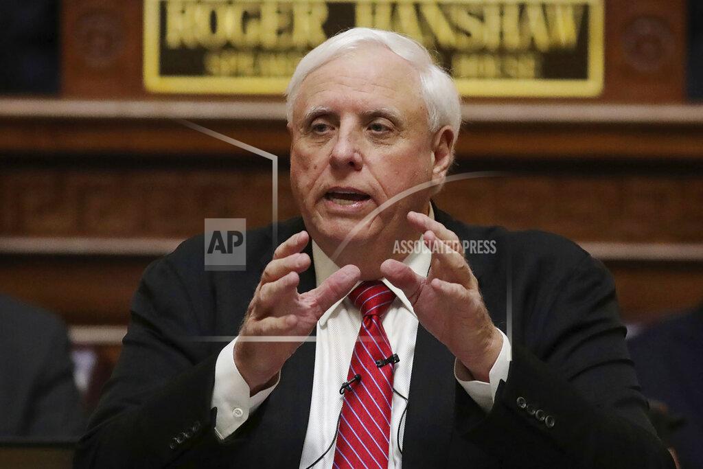 Chris Jackson FILE - In this Jan. 8, 2020, file photo, West Virginia Gov. Jim Justice delivers his annual State of the State address in the House Chambers at the state capitol in Charleston, W.Va. Justice said Thursday, July 2, 2020, that residents should prepare for a mandatory face mask order as the state’s new coronavirus cases rise to their highest level since the pandemic began. (AP Photo/Chris Jackson, File)