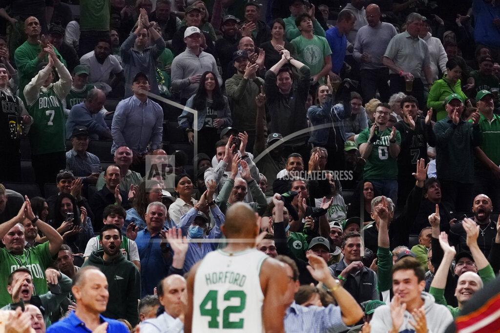 Charles Krupa Fans applaud after a drive to the basket by Boston Celtics center Al Horford (42) during the second half of Game 4 of the NBA basketball playoffs Eastern Conference finals against the Miami Heat, Monday, May 23, 2022, in Boston. (AP Photo/Charles Krupa)