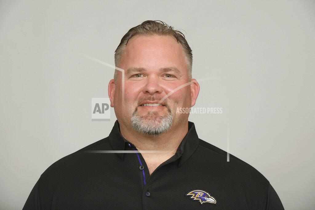 Uncredited File-This July 12, 2019, photo shows Greg Roman of the Baltimore Ravens NFL football team. The mastermind behind the Baltimore Ravens' prolific offense may be headed elsewhere after the team has completed its playoff run. Coach John Harbaugh confirmed Monday, Dec. 30, 2019, that the Cleveland Browns have asked permission to talk to Roman about their vacant head coaching job, and the Ravens will allow that interview to take place. Harbaugh suspects the interview could occur this week, because top-seeded Baltimore has a bye before opening the playoffs on Jan. 11. (AP Photo/File)