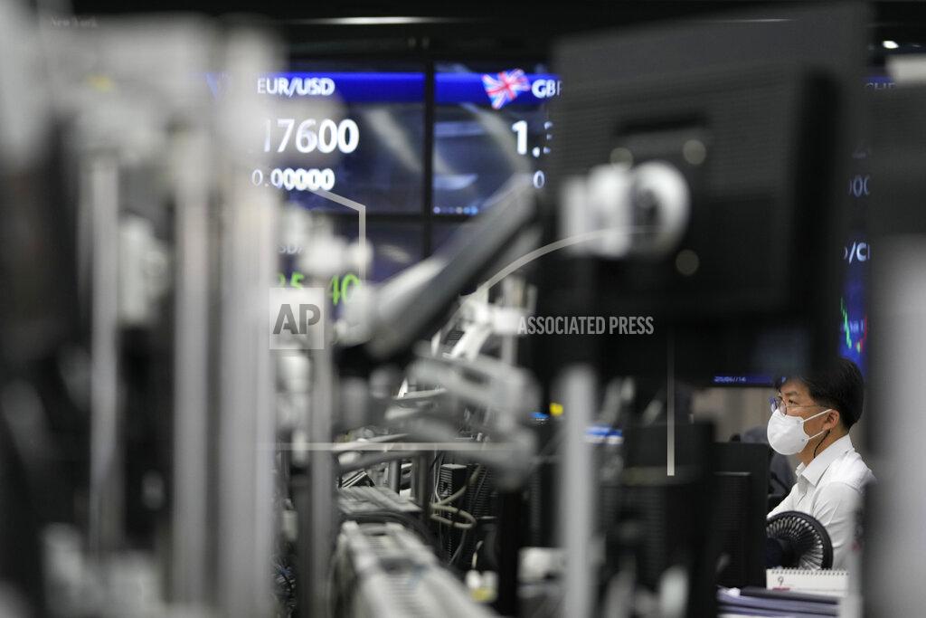 Lee Jin-Man A currency trader watches computer monitors at a foreign exchange dealing room in Seoul, South Korea, Friday, Sept. 17, 2021. Asian shares were mixed on Friday after a hodge-podge of economic data led Wall Street to close mostly lower. (AP Photo/Lee Jin-man)