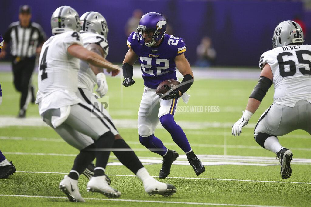 Jim Mone Minnesota Vikings free safety Harrison Smith (22) returns an interception during the first half of an NFL football game against the Oakland Raiders, Sunday, Sept. 22, 2019, in Minneapolis. (AP Photo/Jim Mone)
