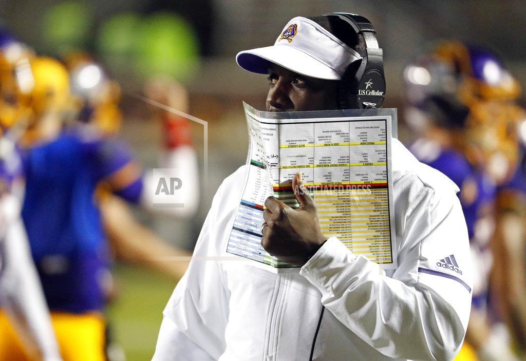 Karl B Deblaker East Carolina head coach Scottie Montgomery walks the sideline during the second half of an NCAA college football game against Central Florida in Greenville, N.C., Saturday, Oct. 20, 2018. UCF won 37-10. (AP Photo/Karl B DeBlaker)