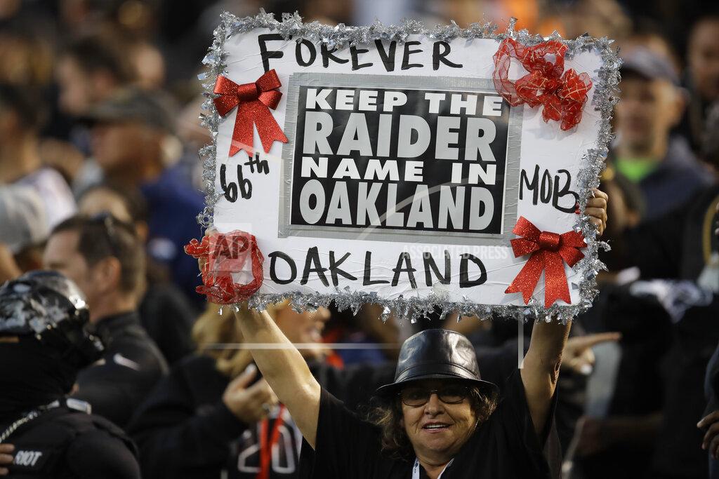 Ben Margot A fan holds up a sign during the first half of an NFL football game between the Oakland Raiders and the Denver Broncos Monday, Sept. 9, 2019, in Oakland, Calif. (AP Photo/Ben Margot)