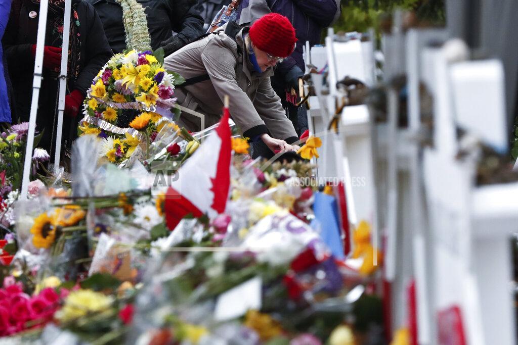 Keith Srakocic FILE - In this Saturday, Nov. 3, 2018 file photo, people place stones near the memorials outside the Tree of Life Synagogue after a service in Pittsburgh. Eleven people were killed and six others injured in a shooting during services there a week earlier. (AP Photo/Keith Srakocic)
