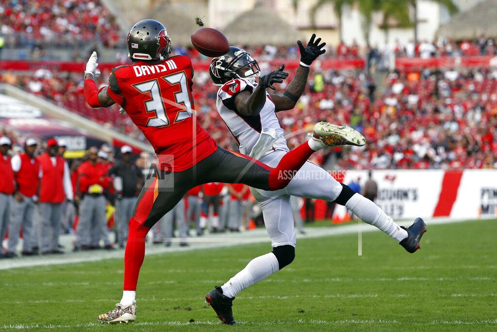 Mark Lomoglio Tampa Bay Buccaneers cornerback Carlton Davis III (33) breaks up a pass intended for Atlanta Falcons wide receiver Julio Jones (11) during the first half of an NFL football game Sunday, Dec. 29, 2019, in Tampa, Fla. (AP Photo/Mark LoMoglio)