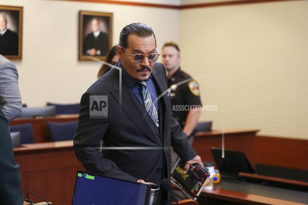 Evelyn Hockstein Actor Johnny Depp arrives at the Fairfax County Circuit Courthouse in Fairfax, Va., Wednesday, May 25, 2022. Depp sued his ex-wife Amber Heard for libel in Fairfax County Circuit Court after she wrote an op-ed piece in The Washington Post in 2018 referring to herself as a "public figure representing domestic abuse." (Evelyn Hockstein/Pool photo via AP)