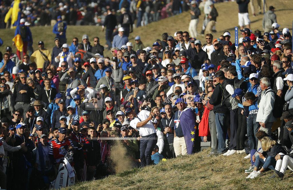 Matt Dunham FILE - In a Sept. 29, 2018 photo, Brooks Koepka of the US plays out of the rough during a foursome match on the second day of the 42nd Ryder Cup at Le Golf National in Saint-Quentin-en-Yvelines, outside Paris, France. A decision is looming whether to play the Ryder Cup in Wisconsin in September 2020 with fans or even postpone it until next year. (AP Photo/Matt Dunham, File)