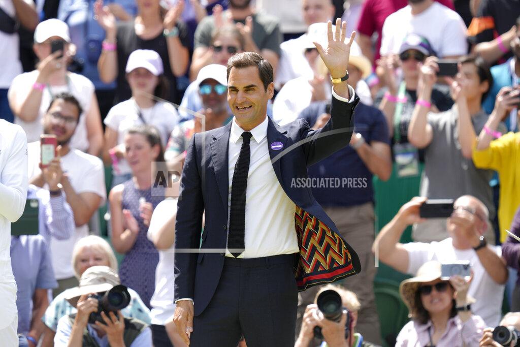 Kirsty Wigglesworth Switzerland's Roger Federer waves during a 100 years of Centre Court celebration on day seven of the Wimbledon tennis championships in London, Sunday, July 3, 2022. (AP Photo/Kirsty Wigglesworth)