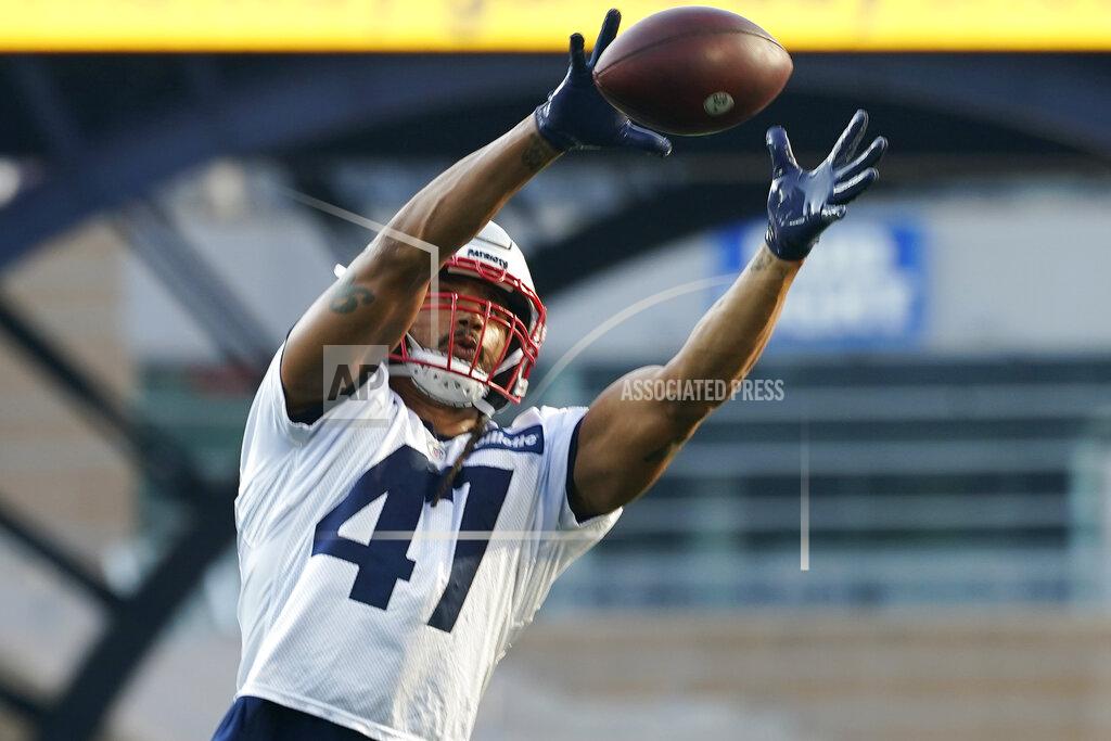Elise Amendola New England Patriots fullback Jakob Johnson (47) catches a pass during an NFL football practice Friday, Aug. 6, 2021, in Foxborough, Mass. (AP Photo/Elise Amendola)