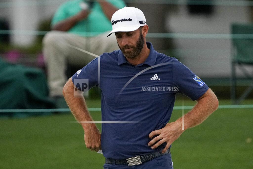 Gregory Bull Dustin Johnson looks down after putting on the 18th hole during the second round of the Masters golf tournament on Friday, April 9, 2021, in Augusta, Ga. (AP Photo/Gregory Bull)