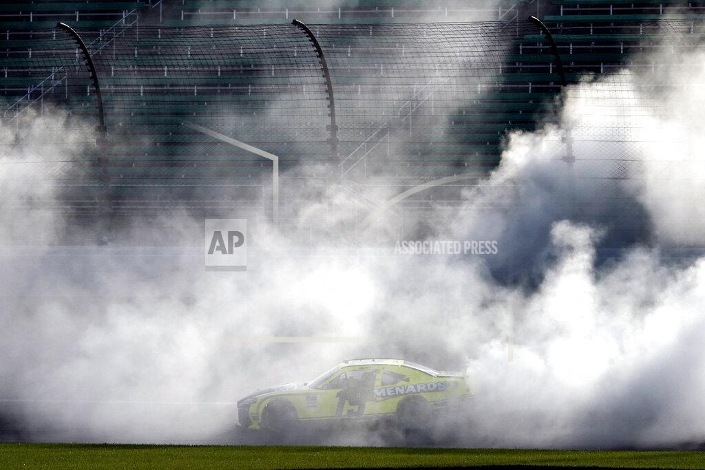 Charlie Riedel Brandon Jones does a burnout after winning a NASCAR Xfinity Series auto race at Kansas Speedway in Kansas City, Kan., Saturday, July 25, 2020. (AP Photo/Charlie Riedel)