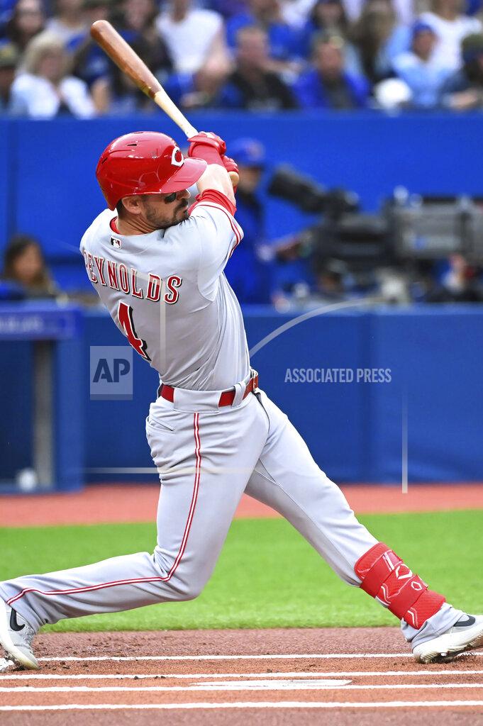 Jon Blacker Cincinnati Reds' Matt Reynods follows through on a single against the Toronto Blue Jays during the first inning of a baseball game Friday, May 20, 2022, in Toronto. (Jon Blacker/The Canadian Press via AP)