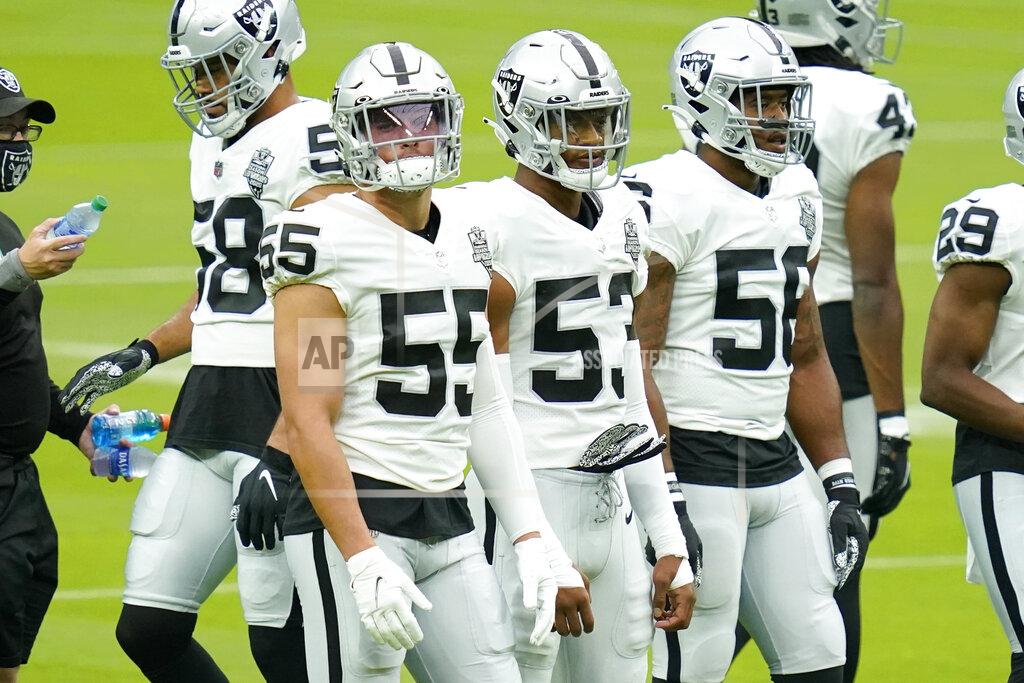 John Locher Las Vegas Raiders linebacker Tanner Muse (55) stands with teammates during an NFL football training camp practice Friday, Aug. 21, 2020, in Las Vegas. (AP Photo/John Locher)