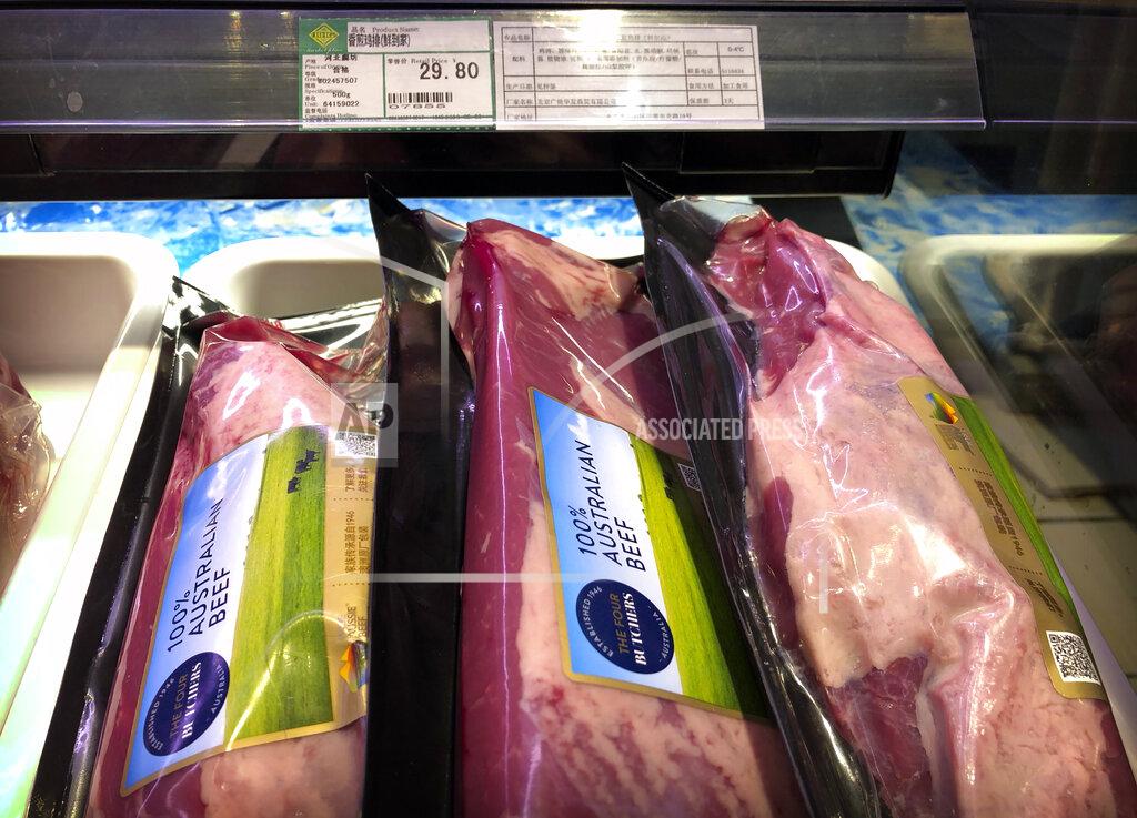 Packages of beef imported from Australia are on sale at a supermarket in Beijing, Friday, May 15, 2020. China has too much at stake to destroy its trading relationship with Australia entirely but is using sanctions to send a sharp warning to the South Pacific nation about its calls for a robust coronavirus inquiry, an expert says. China has suspended beef imports from four Australian slaughterhouses and is threatening to impose huge tariffs on barley after Australia called for independent inquiry into the origins of the virus. (AP Photo/Mark Schiefelbein)