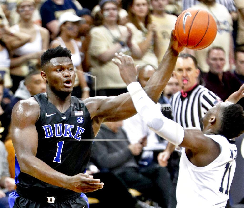 Keith Srakocic Duke's Zion Williamson (1) passes over Pittsburgh's Sidy N'Dir (11) during the second half of an NCAA college basketball game, Tuesday, Jan. 22, 2019, in Pittsburgh. Duke won 79-64. (AP Photo/Keith Srakocic)
