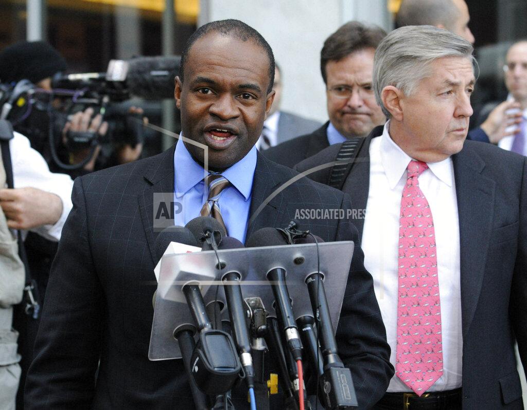 Jim Mone FILE- In this April 6, 2011, file photo DeMaurice Smith, who was head of the NFL Players Association before it dissolved, talks to reporters outside the federal courthouse after a hearing in St. Paul, Minn. At right is players attorney Jim Quinn. Eight years ago, when the NFL was hitting a mere 91 and counting, discord between players and owners reached such a fevered state that the league locked out the union. (AP Photo/Jim Mone, File)