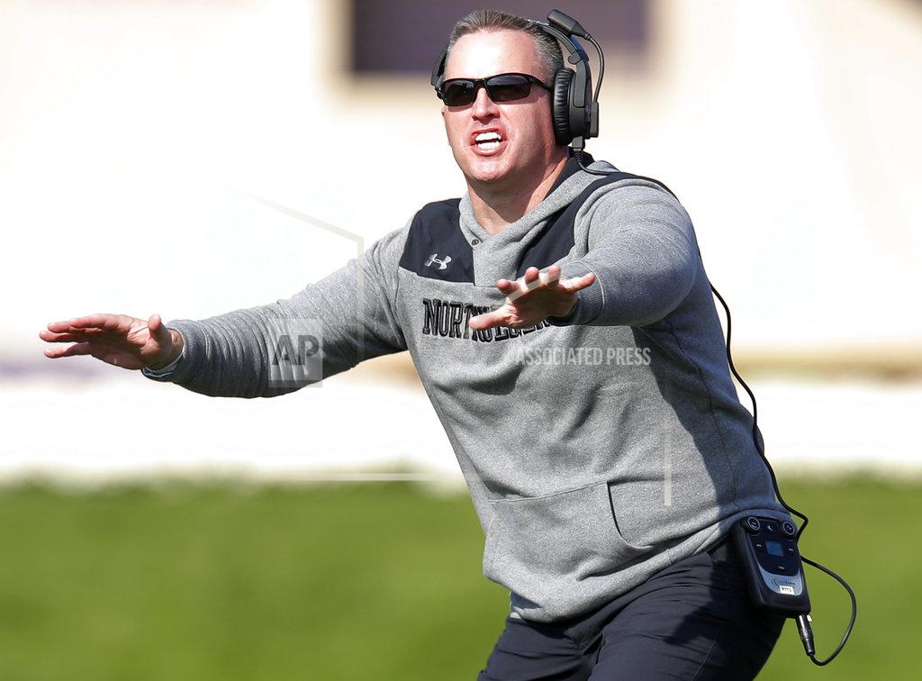 Jim Young Northwestern's Pat Fitzgerald yells from the sidelines during the second half of an NCAA college football game against Nebraska, Saturday, Oct. 13, 2018, in Evanston, Ill. (AP Photo/Jim Young)