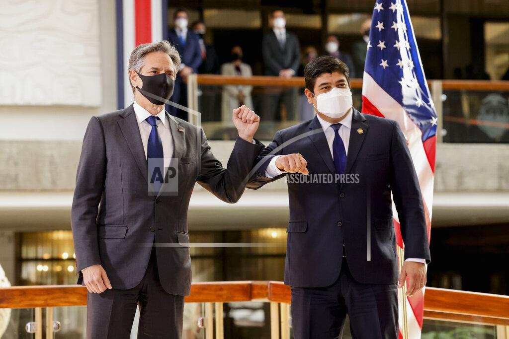 Evelyn Hockstein U.S. Secretary of State Antony Blinken and Costa Rica's President Carlos Alvarado elbow bump after a news conference Tuesday, June 1, 2021, in San Jose, Costa Rica. (Evelyn Hockstein/Pool via AP)