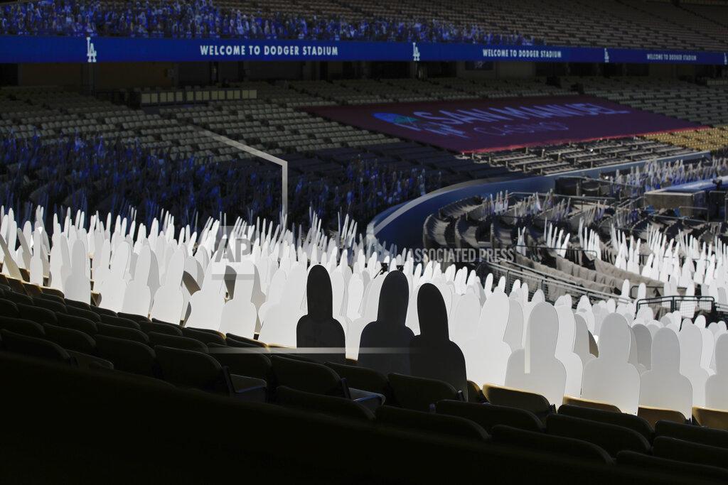 Jae C. Hong Cutouts occupy some of the stadium seats before a baseball game between the Los Angeles Dodgers and the San Francisco Giants, Sunday, July 26, 2020, in Los Angeles. (AP Photo/Jae C. Hong)