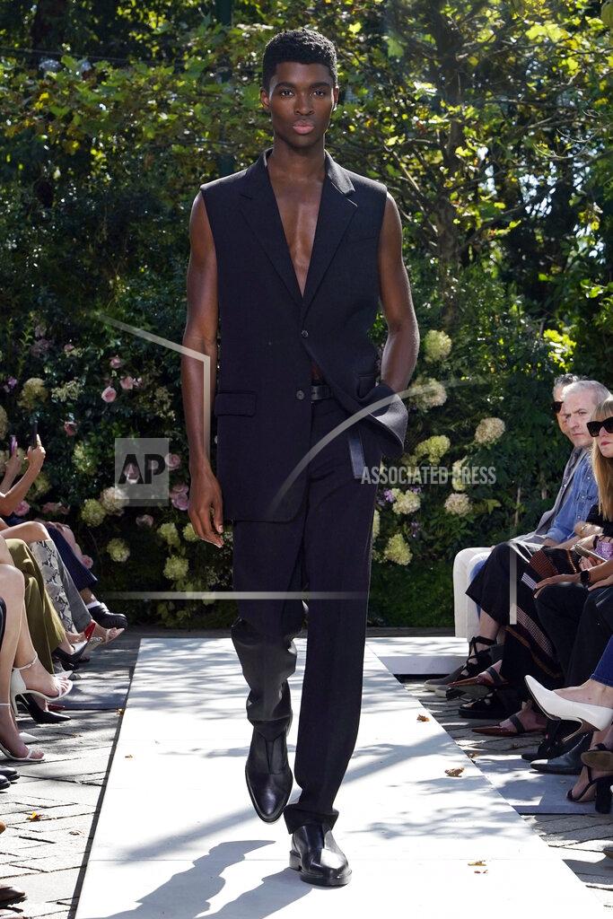 Richard Drew The Michael Kors Spring/Summer 2022 collection is modeled during Fashion Week in New York, Friday, Sept. 10, 2021. (AP Photo/Richard Drew)