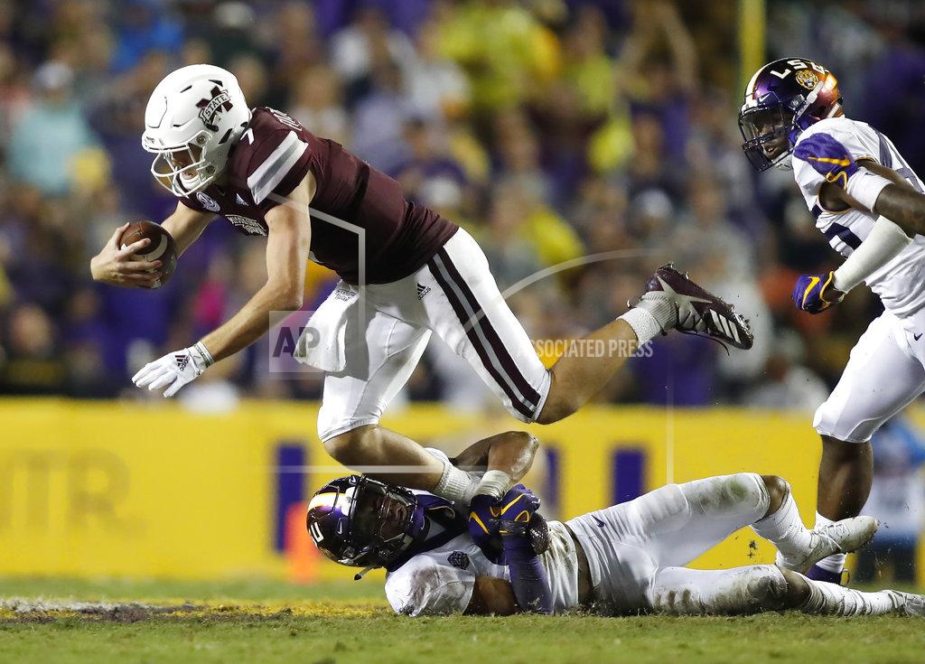 Tyler Kaufman Mississippi State quarterback Nick Fitzgerald (7) is stopped by Mississippi State defensive end Montez Sweat (9) during an NCAA college football game in Baton Rouge, La., Saturday, Oct. 20, 2018. LSU won 19-3. (AP Photo/Tyler Kaufman)