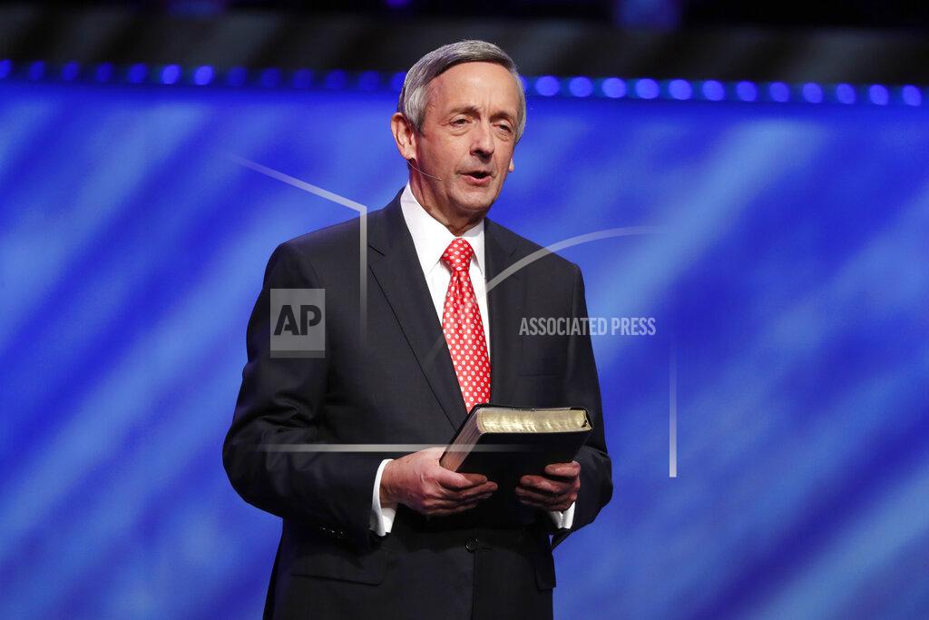 FILE - In this Sunday, June 28, 2020 file photo, Senior Pastor Dr. Robert Jeffress addresses attendees at First Baptist Church Dallas during a Celebrate Freedom Rally in Dallas. Jeffress believes a majority of his congregation welcome the COVID-19 vaccines, while some have doubts about their safety or worry they have links to abortion. Jeffress is among numerous religious leaders who say the leading vaccines are acceptable given their remote, indirect links to lines of cells developed from aborted fetuses. (AP Photo/Tony Gutierrez)