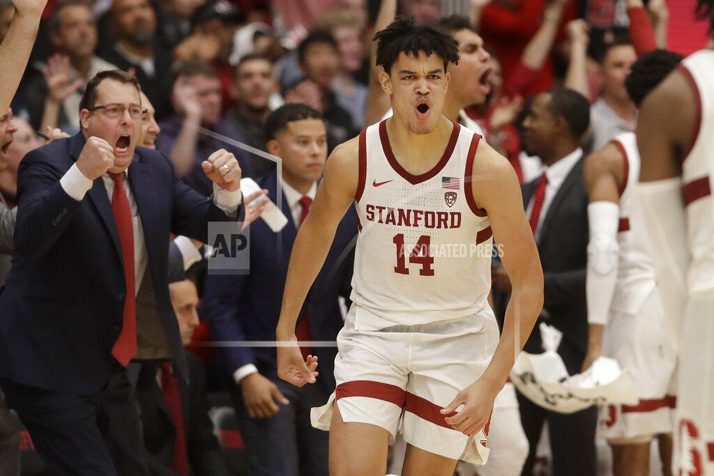 Jeff Chiu Stanford coach Jerod Haase, left, and players react after forward Spencer Jones (14) made a 3-point basket during the second half of the team's NCAA college basketball game against California in Stanford, Calif., Thursday, Jan. 2, 2020. (AP Photo/Jeff Chiu)