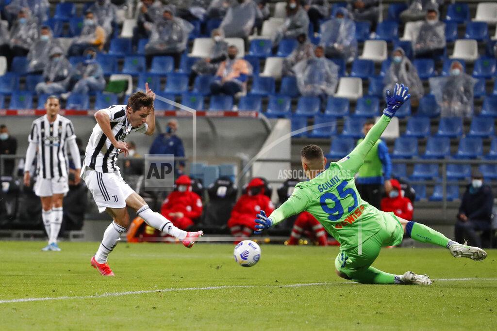 Antonio Calanni Juventus' Federico Chiesa scores a goal against Atalanta during the Italian Cup soccer final match between Atalanta and Juventus at the Mapei Stadium in Reggio Emilia, Italy, Wednesday, May 19, 2021. (AP Photo/Antonio Calanni)