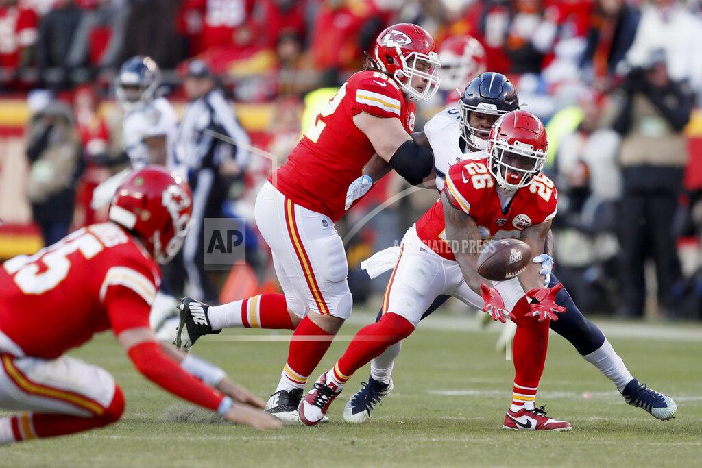 Charlie Neibergall Kansas City Chiefs' Damien Williams (26) can't catch a pass during the second half of the NFL AFC Championship football game against the Tennessee Titans Sunday, Jan. 19, 2020, in Kansas City, MO. (AP Photo/Charlie Neibergall)