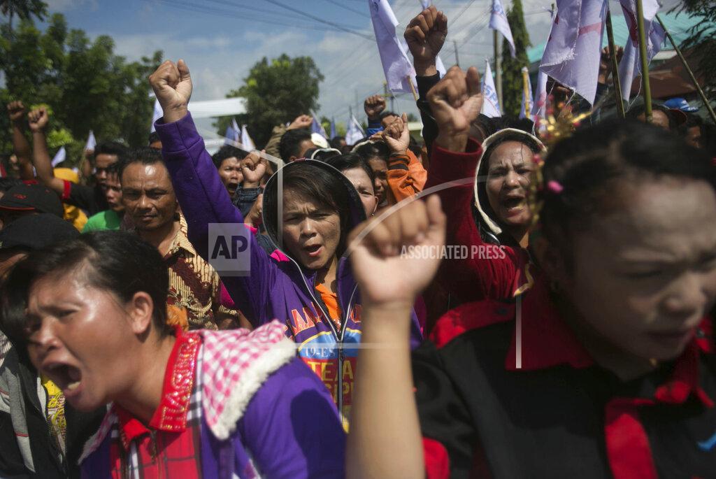 Binsar Bakkara Palm oil workers hold a rally demanding to be treated fairly in Rantau Prapat, North Sumatra, Indonesia, on Nov. 15, 2017. The Associated Press has found systematic labor abuses on plantations big and small, including some that meet certification standards set by the global Roundtable on Sustainable Palm Oil, an association whose members include palm oil producers, buyers, traders and environmental watchdogs. (AP Photo/Binsar Bakkara)