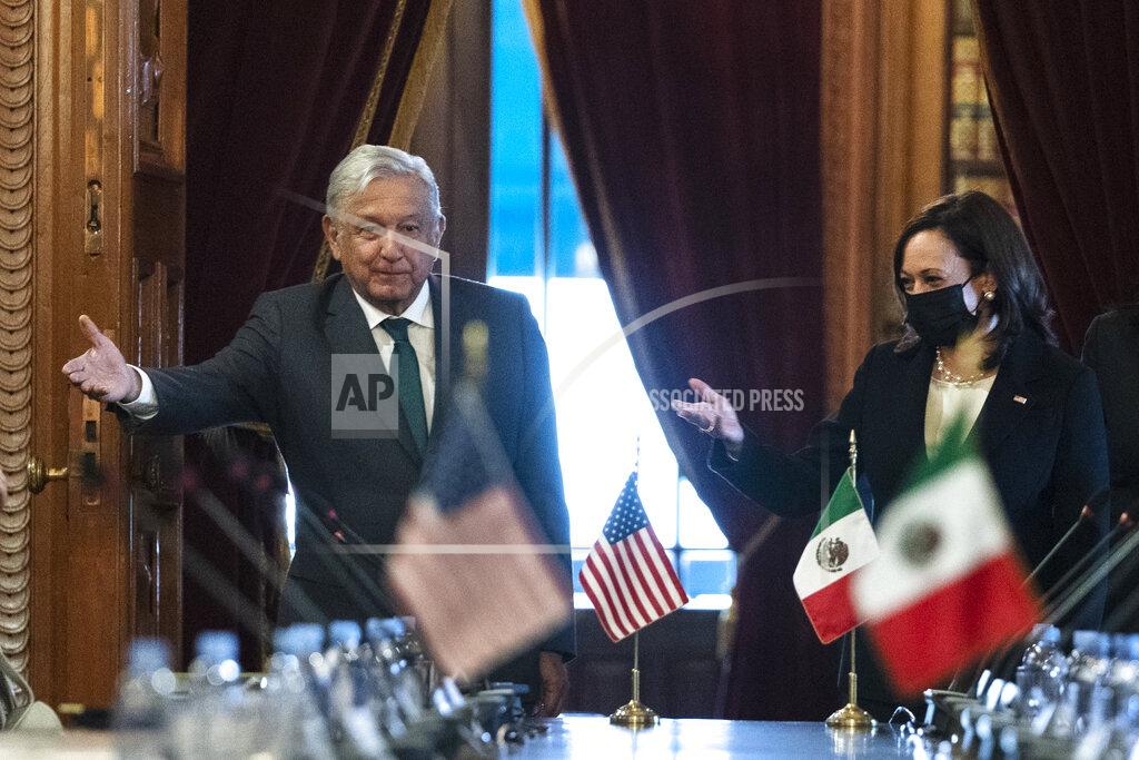 Jacquelyn Martin Vice President Kamala Harris and Mexican President Andres Manuel Lopez Obrador arrive for a bilateral meeting Tuesday, June 8, 2021, at the National Palace in Mexico City. (AP Photo/Jacquelyn Martin)