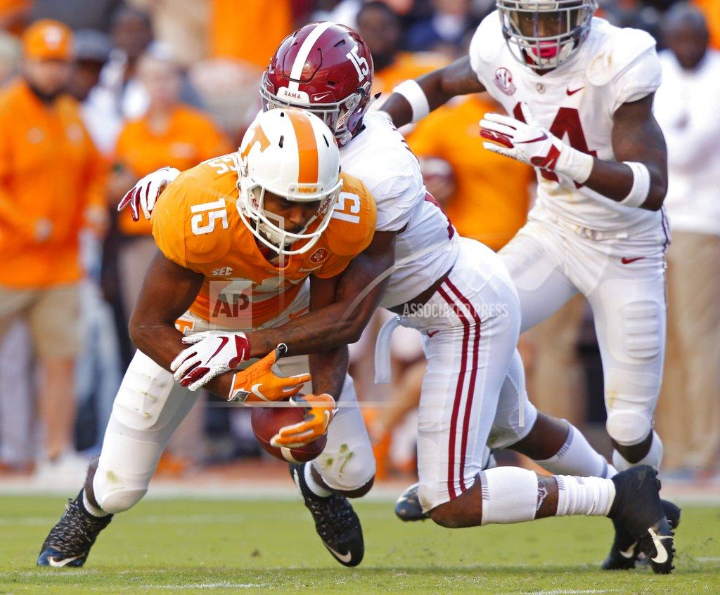Wade Payne Tennessee wide receiver Jauan Jennings (15) fumbles the ball as he's hit by Alabama defensive back Xavier McKinney (15) in the first half of an NCAA college football game Saturday, Oct. 20, 2018, in Knoxville, Tenn. (AP Photo/Wade Payne)