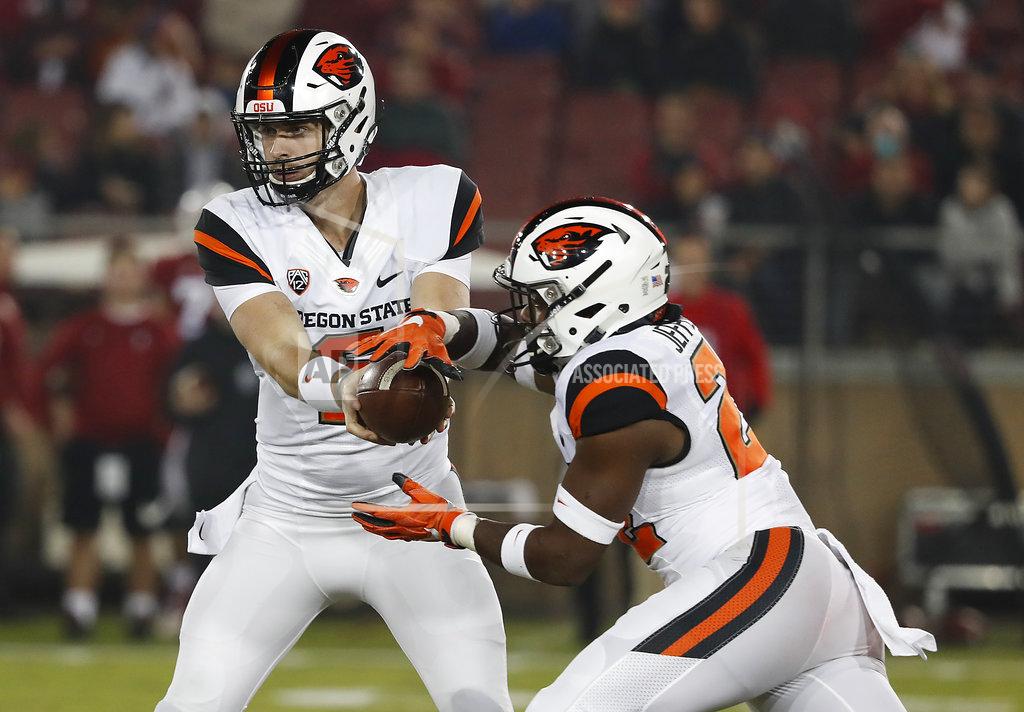 Tony Avelar Oregon State quarterback Jake Luton (6) hands off to Oregon State running back Jermar Jefferson (22) against Stanford in the first half during an NCAA college football game on Saturday, Nov. 10, 2018, in Stanford, Calif. (AP Photo/Tony Avelar)