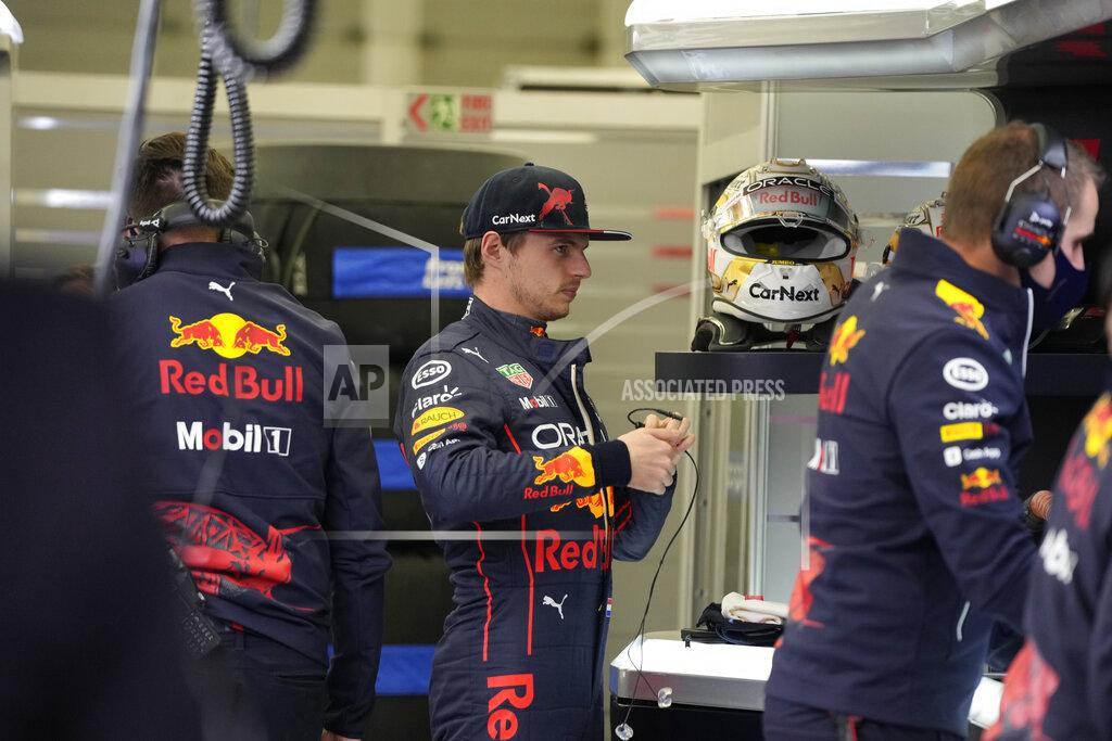 Hassan Ammar Red Bull driver Max Verstappen of the Netherlands gets ready during a practice for theFormula One Bahrain Grand Prix it in Sakhir, Bahrain, Friday, March 18, 2022. (AP Photo/Hassan Ammar)
