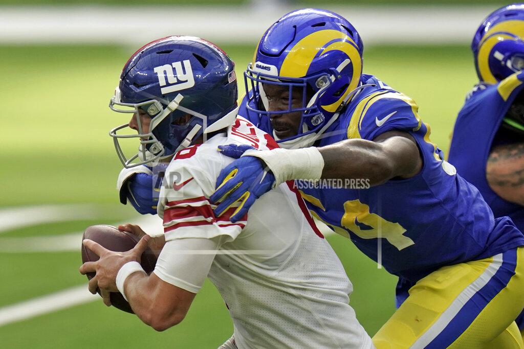 Jae C. Hong New York Giants quarterback Daniel Jones, left, is tackled by Los Angeles Rams outside linebacker Leonard Floyd during the second half of an NFL football game Sunday, Oct. 4, 2020, in Inglewood, Calif. (AP Photo/Jae C. Hong)