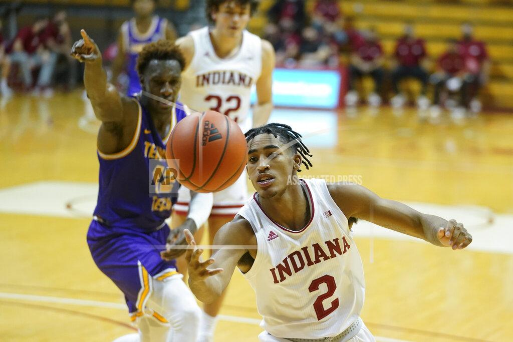 Darron Cummings Indiana's Armaan Franklin (2) grabs a loose ball as Tennessee Tech's Amadou Sylla (12) watches during the second half of an NCAA college basketball game, Wednesday, Nov. 25, 2020, in Bloomington, Ind. (AP Photo/Darron Cummings)