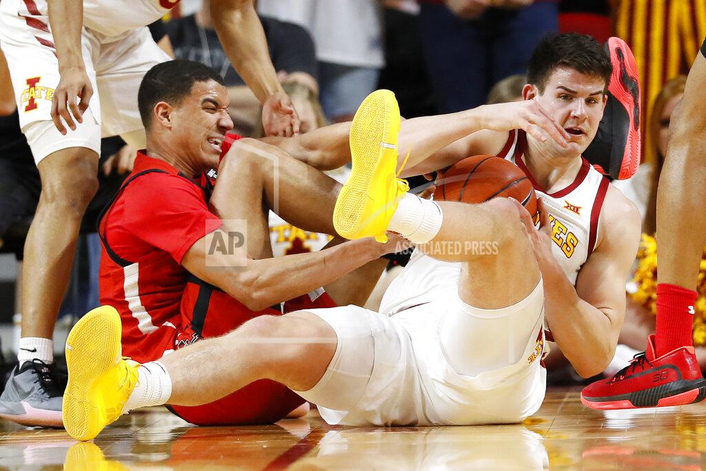 Charlie Neibergall Iowa State forward Michael Jacobson, right, fights for a loose ball with Texas Tech guard Kevin McCullar during the first half of an NCAA college basketball game Saturday, Feb. 22, 2020, in Ames, Iowa. (AP Photo/Charlie Neibergall)