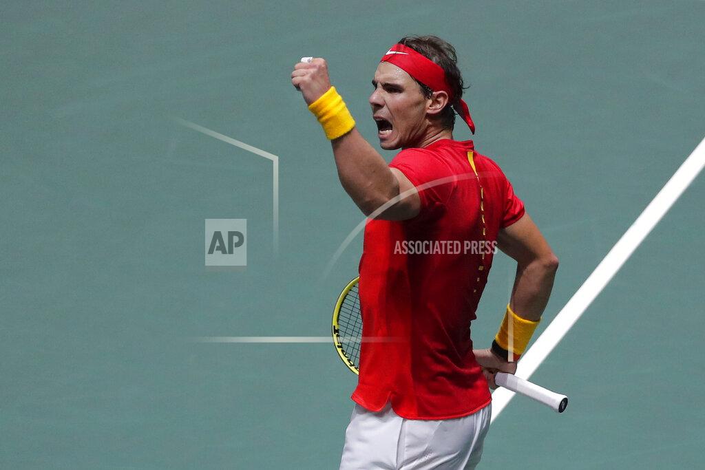 Spain's Rafael Nadal celebrates celebrates a point against Russia's Karen Khachanov during their Davis Cup tennis match in Madrid, Spain, Tuesday, Nov. 19, 2019. (AP Photo/Manu Fernandez)