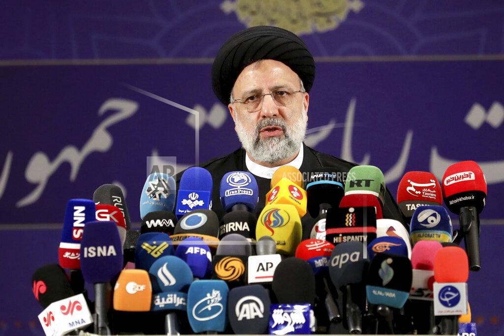 Ebrahim Noroozi Ebrahim Raisi, head of Iran's judiciary speaks to media after registering his name as a candidate for the June 18 presidential elections at the elections headquarters of the Interior Ministry in Tehran, Iran, Saturday, May 15, 2021. (AP Photo/Ebrahim Noroozi)