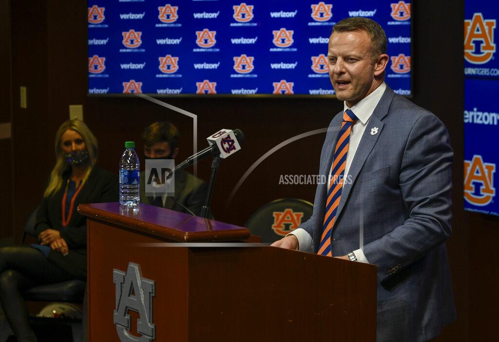 Todd Van Emst In this photo provided by Auburn Athletics, Bryan Harsin, Auburn's new college football coach, speaks during a conference Thursday, Dec. 24, 2020, in Auburn, Ala. (Todd Van Emst/Auburn Athletics via AP)